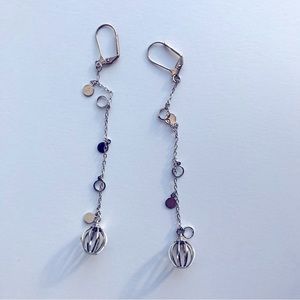 Silver dangling birdcage earrings preowned.